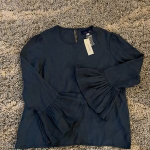 Francesca’s dark teal top